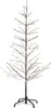 A lit artificial Christmas tree with a black stand. Produktbild-Vorschau