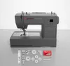 A Singer Heavy Duty sewing machine is displayed on a light gray surface with a white background. Various sewing accessories are arranged in front of the machine. Náhled obrázku produktu
