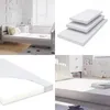 A collage of images showing a child's mattress in different settings and close-ups. Voir les images du produit