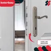 A close-up view of a door handle and lock mechanism on a white door. Podgląd zdjęcia produktu
