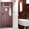A bathroom with a door and sink area. Produktbild-Vorschau
