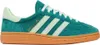 A single Adidas Handball Spezial shoe is shown from the side against a white background. Produktbild-Vorschau