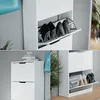 A collage of images showing a white shoe cabinet with multiple flip-out drawers, some containing shoes. Produktbild-Vorschau