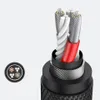 A detailed cross-section view of a Ugreen audio splitter cable, showing its internal construction and layers. Podgląd zdjęcia produktu