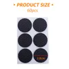 A sheet of round, black, textured anti-slip pads. Produktbild-Vorschau