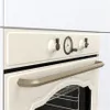A close-up view of the control panel and handle of a cream-colored oven. Produktbild-Vorschau