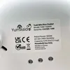 A close-up view of a label on a white appliance, likely a rice cooker. Voir les images du produit
