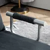 A close-up view of a sofa armrest with a dark fabric cover. Náhled obrázku produktu