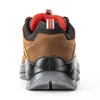 The back view of a brown work shoe with red mesh lining. Produktbild-Vorschau