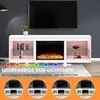 A white TV stand with a built-in electric fireplace and LED lighting, displayed in a living room setting. Voir les images du produit