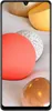 A smartphone with a wallpaper featuring abstract spheres. Produktbild-Vorschau