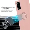 A pink phone case with a ring holder is shown attached to a magnetic car mount on a car air vent. Podgląd zdjęcia produktu