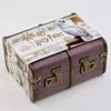 A Harry Potter themed advent calendar shaped like a trunk, with a snowy owl and snowflakes on the packaging. Produktbild-Vorschau