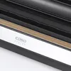 A close-up view of a vacuum sealer machine, showing the brand logo and a decorative wood-grain accent. Anteprima dell’immagine prodotto
