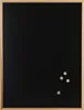 A black magnetic chalkboard with a wooden frame and four small circular magnets attached to the bottom right corner. Produktbild-Vorschau