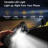 A hand holding a rugged smartphone with a bright LED light illuminating the scene in a dark outdoor environment. Produktbild-Vorschau