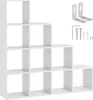 A white, multi-tiered shelving unit designed in a staggered, staircase-like pattern, shown with included mounting hardware. Náhled obrázku produktu