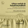 Close-up of fabric texture with text overlays highlighting product features. Produktbild-Vorschau