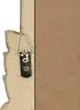 Close-up of the back of a mirror frame, showing a hanging hook attached with screws. Anteprima dell’immagine prodotto