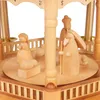 A close-up view of a wooden Christmas pyramid with nativity figures. Produktbild-Vorschau