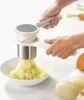 Hands using a potato ricer to mash potatoes into a bowl. Anteprima dell’immagine prodotto