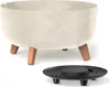 A cream-colored planter with a concrete effect and wooden legs, shown with a black drainage tray. Náhled obrázku produktu