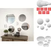 A collection of round mirrors of various sizes are arranged on a white wall above a wooden dresser. A potted plant and some decorative bottles are on the dresser. Podgląd zdjęcia produktu