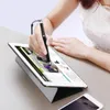 A person is using a stylus on a tablet, with a smartphone in the foreground. Anteprima dell’immagine prodotto