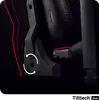 Close-up of a black gaming chair's recline mechanism and headrest. Red lines highlight movement and angles. Anteprima dell’immagine prodotto