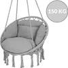 A gray hanging chair with cushions and tassels, suspended by ropes. Produktbild-Vorschau
