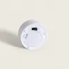 The bottom of a white LED tea light is shown on a light gray background. Anteprima dell’immagine prodotto