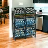 A metal rack holding several crates of bottled water in a kitchen or dining area. Produktbild-Vorschau