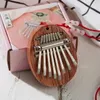 Mini kalimba - 8 touches - bois d'acajou - piano à pouces Voir les images du produit 4