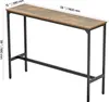 A long, narrow bar table with a rustic wood-look top and black metal legs, shown against a white background with dimensions indicated. Podgląd zdjęcia produktu