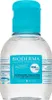 A clear studio shot of a small bottle of Bioderma micellar water with a blue cap. Podgląd zdjęcia produktu