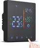 A digital thermostat with a black casing and a bright LED display showing temperature, time, and settings. A finger is shown pressing a button on the bottom right. Náhľad obrázku produktu