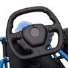 Close-up of a toy steering wheel and part of a blue frame. Produktbild-Vorschau