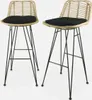 Two bar stools with rattan backs and black cushions on metal legs. Anteprima dell’immagine prodotto