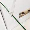 A close-up view of a shower enclosure hinge and a small shelf with toiletries. Produktbild-Vorschau