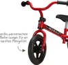 Close-up of a red balance bike with text describing its features. Produktbild-Vorschau