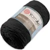 A roll of black macrame cotton cord on a white background. Podgląd zdjęcia produktu