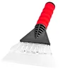 A close-up studio shot of an ice scraper against a white background. Produktbild-Vorschau