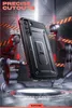 A black phone case is presented in a futuristic, industrial setting with robotic arms. Náhled obrázku produktu