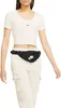 A person wearing a crop top and cargo pants, with a fanny pack around their waist. Náhled obrázku produktu