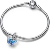 A silver Pandora bracelet with a blue butterfly charm and a clasp with the Pandora logo. Podgląd zdjęcia produktu