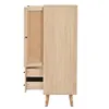 A side view of a tall, narrow wooden cabinet with one door open, revealing drawers. The cabinet has rattan detailing on the door and sits on tapered wooden legs. Anteprima dell’immagine prodotto