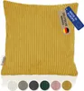 A yellow corduroy cushion with tags indicating it is made in Europe and a German brand. Produktbild-Vorschau