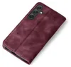 A burgundy flip case for a smartphone, shown from a diagonal top-down perspective. Produktbild-Vorschau