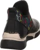 Rear view of a black boot with a colorful patterned elasticated ankle cuff. Voir les images du produit