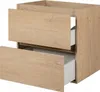 A light brown wooden cabinet with two drawers, one partially open. Podgląd zdjęcia produktu